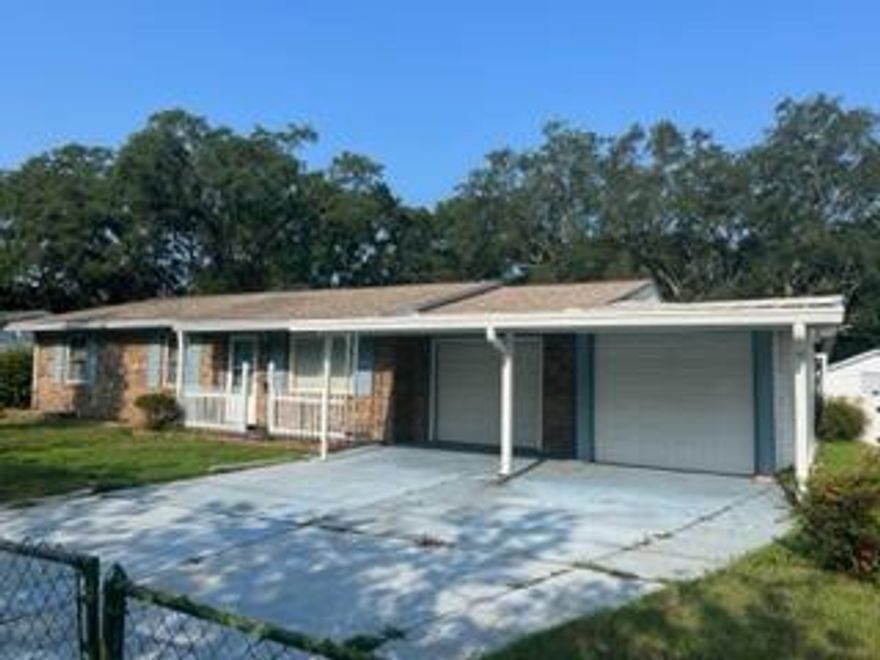 Investor Special - home is in good condition and has been well maintained, but home is being sold 'AS IS'.  Seller will not make any repairs.  Property contains alumiconn connectors throughout. This would be a great rental home. Home features 3 bedrooms and 1 full and 1 half bath, a 2 car garage, a covered front porch, a covered patio and a detached workshop building.  The kitchen has been updated and features granite countertops and a tile backsplash.  Windows have been updated.  The floor plan features a family room, a living / florida room and a hobby room with a sink, 2 single car garage bays and an enclosed storage room off of the garage.  The roof was replaced in 2007, hot water heater in 2017 and the HVAC in 2012.