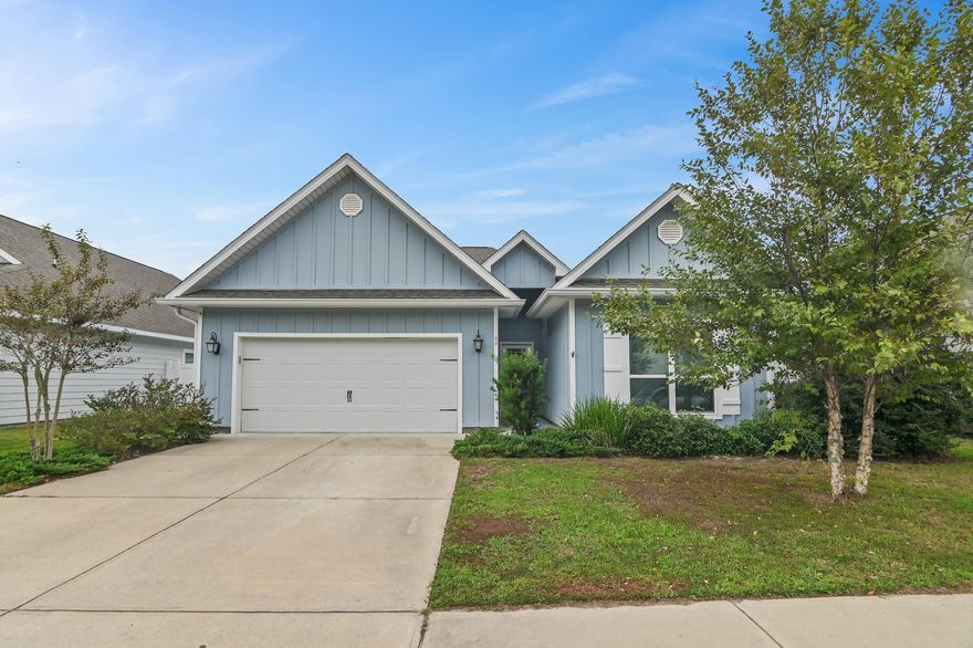 Discover this like-new multi-generational home, perfectly located in sought-after Santa Rosa Beach. Spanning 2,122 sq. ft., this property includes a spacious 3-bedroom, 2-bath main residence and a private 1-bedroom, 1-bath lock-off suite, offering flexibility for extended family, guests, or long-term rental opportunities.Inside, enjoy an open floor plan that seamlessly blends living and dining areas--ideal for both relaxation and entertaining. The kitchen boasts smart appliances, granite countertops, and plentiful workspace, appealing to home cooks and hosts alike. The primary suite is a serene retreat, complete with an ensuite bathroom featuring a soaking tub and separate shower. Two additional bedrooms provide ample space for family or a home office, along with another full bath. The standout feature of this home is the multi-generation feature, which includes a private entrance, a cozy living area, a full kitchen, a bedroom, and a full bathroom - ideal for guests, family, or as a long-term rental option. Outside, the spacious backyard offers a peaceful oasis for relaxation and outdoor gatherings, with a patio area perfect for barbecues and entertaining. Located on a 0.16-acre lot in the Stonegate neighborhood, this home provides convenient access to nearby essentials like Walmart, Publix, Grand Boulevard, and the pristine 30A beaches, only minutes away.