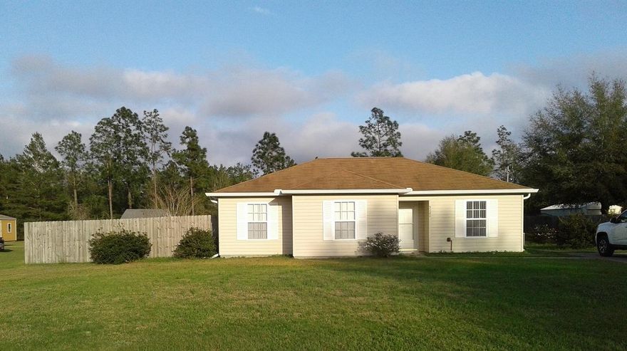 Super cute and well cared for!Quiet neighborhood and very nice. The home has new flooring and paint, semi open floor plan with dining space. The living space is good size with a large screen porch in the back. Fenced in on either side, the home sits on a nice lot with .51/acre and is well landscaped with an oversize driveway. Beautiful light fixtures and hardware give great attention to detail.