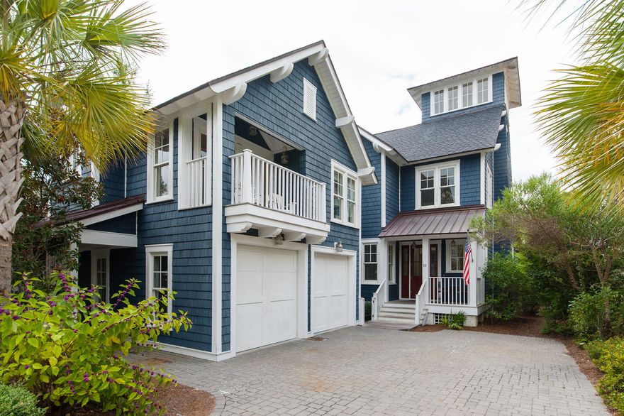 Primely situated in Phase One of WaterSound Beach, 30 E. Yacht Pond Lane is nestled on a quiet homesite, conveying gulf views, just a stroll to the beach. The quintessential family beach house. A total of five bedrooms & five full baths, the three-level main house holds four bedrooms & the carriage house above the two-car garage offers an additional bed & bath as well as a guest living area & guest house kitchen. Gulf views from the third level tower, with wet bar & sitting area for sunsets. French doors from the living area open to the screened porch with an outdoor fireplace, overlooking the pond. Strong rental income, $105K projected. With a crisp coastal design, 30 E. Yacht Pond is reminiscent of days-gone-by at the beach, capturing the ''perfect family beach house.''