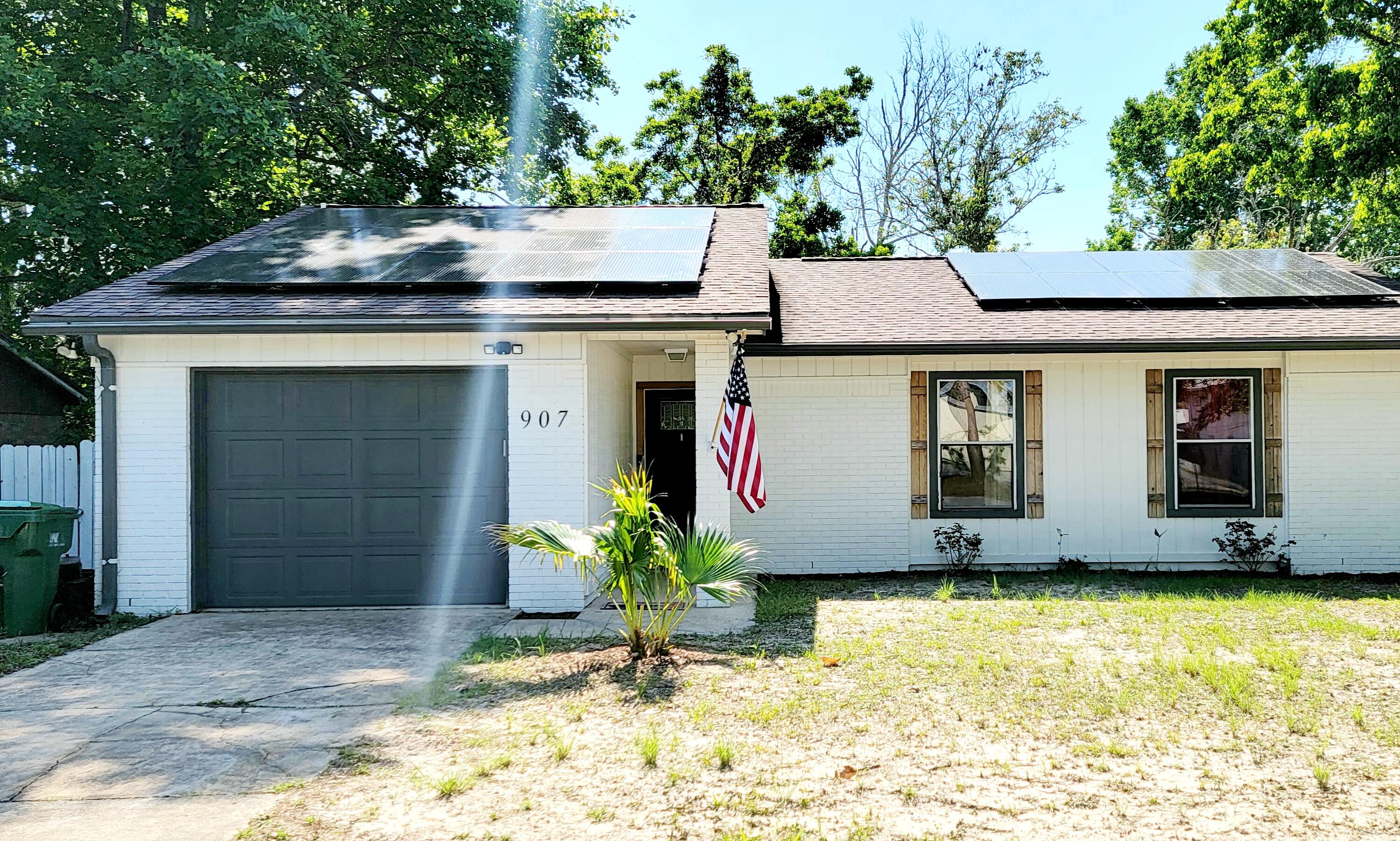 Adorable, Move-In Ready Home in Excellent Location! Just a 3 minute drive or 30 minute walk (for the sporty type) to Niceville's popular waterfront park on Bayshore Dr! Here you can walk the trails, launch your boat, enjoy the sunset and take in the views! It's about 8 miles to the sandy Florida Beaches that we ALL LOVE!! Open & Spacious Floor Plan for a Modern Feel ** This Home was Transformed about 2 Years Ago offering All White Shaker Style Cabinets with Soft Close Drawers ** Stainless Appliances ** Gorgeous Granite Counters w/ Large Breakfast Bar ** Popular LVP Flooring Throughout the Entire Home ** Sliding Glass Doors to the Covered Patio & Fenced Backyard ** Yard Building ** PLUS SOLAR PANELS INCLUDED!! Keep Your Power Bills Ultra LOW! Owners March 2021 bill was ONLY $30!!