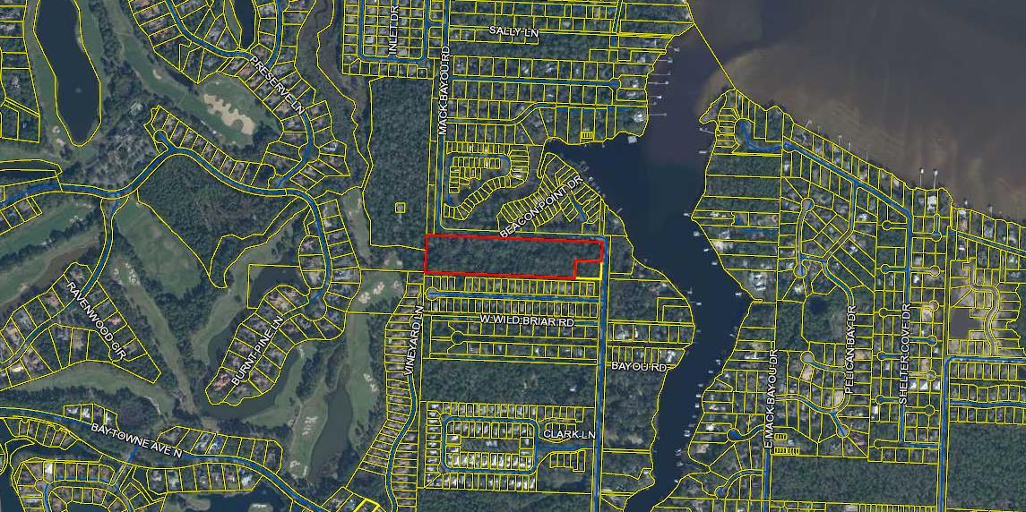 Note the acreage. Property zoned neighborhood infill allowing a mixture of uses. clustered town homes, estate lots, smaller lots or a mixture. A rare find! This 9.36 acre property has gorgeous towering oaks, magnolias and pine trees galore. There are 2 homes on site. Under a nationwide permit, you could reduce the small amount of wetlands (0.94 acre) to .044 acre. The second home is approximately 900 sq.ft., built with framing of a motor home barn. Virtually all the property is in Flood Zone X. Boat Launch across the street. Close proximity to local favorite shopping, dining, entertainment, Sacred Heart Hospital, and sugar white sand of the Emerald Coast Beaches. Listing realtor in the process of verifying all utility availability.