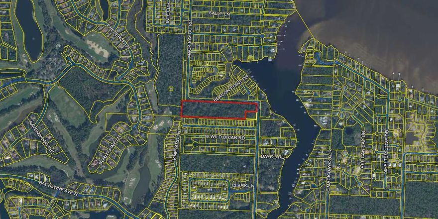 Note the acreage. Property zoned neighborhood infill allowing a mixture of uses. clustered town homes, estate lots, smaller lots or a mixture. A rare find! This 9.36 acre property has gorgeous towering oaks, magnolias and pine trees galore. There are 2 homes on site. Under a nationwide permit, you could reduce the small amount of wetlands (0.94 acre) to .044 acre. The second home is approximately 900 sq.ft., built with framing of a motor home barn. Virtually all the property is in Flood Zone X. Boat Launch across the street. Close proximity to local favorite shopping, dining, entertainment, Sacred Heart Hospital, and sugar white sand of the Emerald Coast Beaches. Listing realtor in the process of verifying all utility availability.
