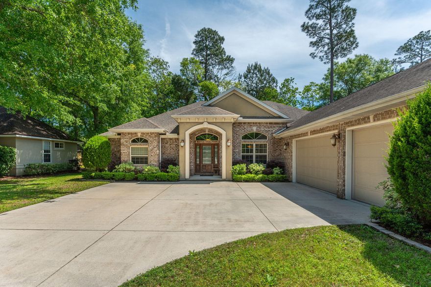 IMPRESSIVE in EVERY WAY! Expansive rooms, ingenious floor plan, masterful quality, classically elegant. This grand 4 bedroom in Claire's Vineyard (one of Crestview's few gated communities) offers visually pleasing details such as brick w stucco accents on the exterior, along with 11 ft ceilings in foyer, Living & Dining rooms, kitchen & family room. There's room for everything in oversize cabinet-city kitchen! Granite counters, kitchen island w vegetable sink, breakfast bar and walk in pantry too, everything but the chef! Custom coffered ceiling w built-in entertainment center lend nicely to the contemporary design of the family room. This split floor plan offers a guest suite w private bath, 2 additional bedrooms and a bath. Master suite has 2 large walk-in closets,