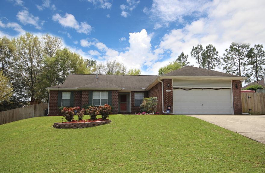 MUST SEE! MOVE-IN READY with ACREAGE!! South of I-10. Easy access to BASES! All Brick Home located on almost an Acre of Land! Open Living Space with New High Quality Laminate Wood Flooring in Main Areas and New Carpet in the Bedrooms. The Study/Office could double as a 4th Bedroom if you chose to add doors. Split Bedroom plan for plenty of privacy. Nice Master Suite. Kitchen has Newer Appliances and Large Eat-In Area. Sellers have added Boat Parking and the Over-Sized Driveway. The Privacy Fenced Back Yard is a Great Gathering Space For All with a Tree House Fort, Fire Pit, and a Yard Building. The Screened Porch adds additional Get Away Space! The HVAC was replaced in 2015. Appliances upgraded between 2012 and 2014. Kitchen Counter Tops were replaced in 2015. buyer to verify sq footage