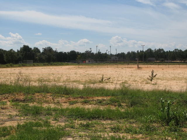 Put in for comps. Buyer had to rezone property from agricutural to commercial. Property purchased was from a larger overall parcel.