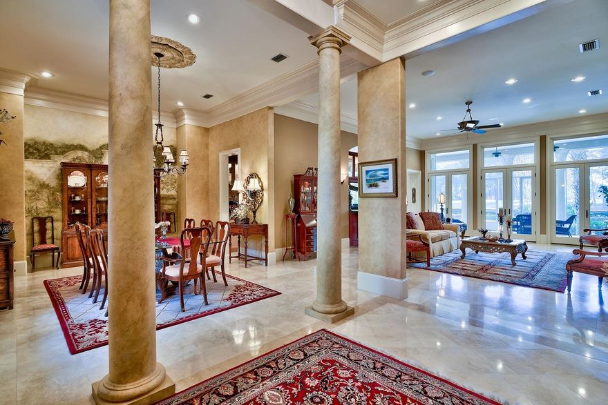 SELLER MOTIVATED TO SELL...This immaculate custom built lake front home is perfectly situated on the 6th hole of the golf course. Generous square footage with 4 bedrooms, 4 full baths, and a half bath. Master Suite on the main level features walk in shower, and separate sauna. Additional living space includes an exercise room, and spacious study. Beautiful views of the golf course and lake from the screened in lanai. Enjoy relaxing by the pool with your family and friends. Call today to preview this fine estate home.