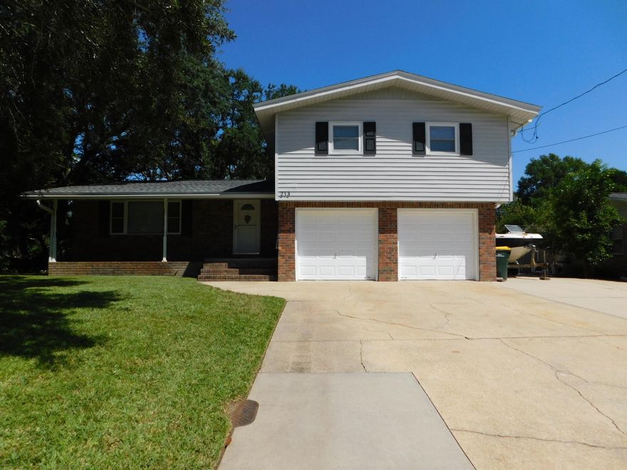 This Very nice home in Bayou Woods is listed for rent and for sale. It has an Efficient Variable Speed HVAC in 2018! There is Lots of concrete for extra Parking! This is an Ideal Home with the Perfect Yard! 3 Bedrooms, 2.5 Baths PLUS Oversized 2-Car Garage, BONUS ROOM, Inside Laundry and Extra Half-Bath! This home is a Dream! Enter into a Large Living Room that flows with natural light to the HUGE Eat-In Kitchen with updated White Cabinets and newer appliances. A few steps will lead you down to the AMAZING BONUS ROOM, 2-Car Garage, Inside Laundry and Half Bath. The Top Floor has the three Very Large Bedrooms and Two Full Baths! The Full Baths have be updated with Deep, Shower/Tubs and modern colors.
