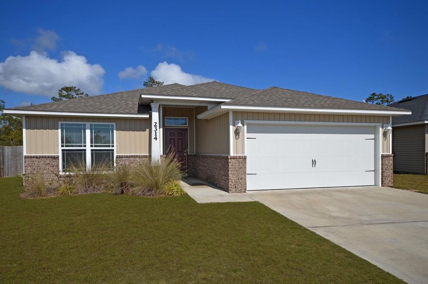 Welcome Home! Beautiful 3 bedroom home in an excellent location. Walking distance to Navarre High! Large Great room with wood laminate flooring & plant ledges. Open kitchen with vaulted ceilings, dining area, granite counters, and stainless appliances. Large Master Suite with wood laminate flooring. The master bath includes double vanity, garden tub, separate shower and a large walk-in closet. Split floor plan. 2nd and 3rd bedrooms are a good size also! Sidewalks, street lights, and underground utilities. Call today to schedule your private showing!