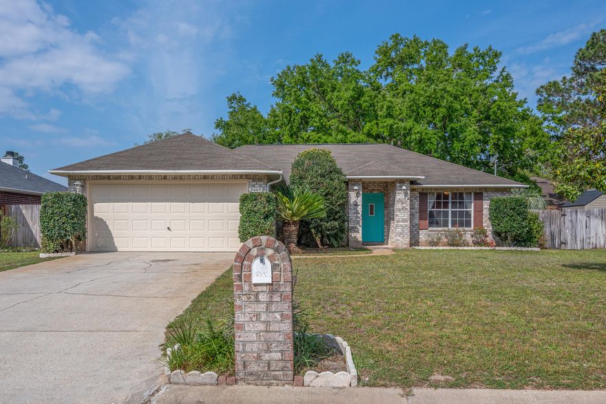 Tucked away in a quiet, ''hidden'' neighborhood, this 3/2 home located just off of 399 in Navarre is an opportunity you don't want to miss. Inside you'll find an open living area with a dining room that can be used as an extra seating space or playroom! The kitchen has plenty of counter space, cabinet storage, plant ledges, a breakfast bar and a breakfast nook with bay window creates a nice open area for a dining room table. The master bedroom has it's own large bathroom with his-and-hers walk-in closets, separate shower and garden tub. Laundry area contains side by side washer and dryer that stays with the home. Conveniently a short commute to Hurlburt, the beach and any shopping or dining you could want.