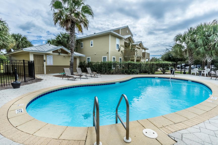 Beautiful unit in TOPSAIL VILLAGE! There are 5 beach accesses within 1 mile!! This Immaculate ground floor unit is close to the pool and centrally located in the TOPSAIL development! Backing up to the State Forest adds great privacy for this ground-Floor unit, & Interior features include granite counter-tops, Tile back splash in kitchen, wood cabinets, and new carpet. FLOOD ZONE X. This unit won't last long! Come get your piece of 30A! Whether its your primary residence or a rental property what a great investment!