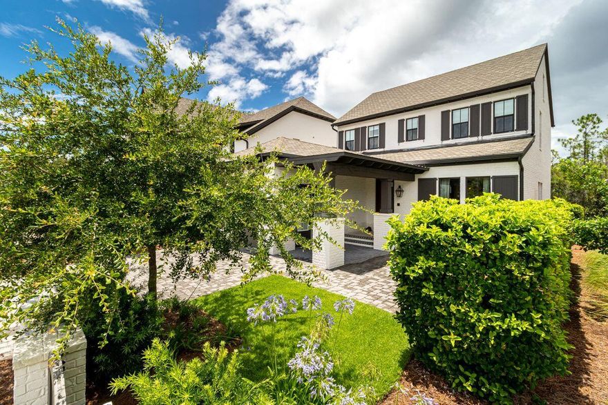 Splendidly located in a gated community at the quieter west end of 30A, this nearly new home was completed in 2017. Conveyed fully furnished, it even comes with a four-seat GOLF CART for getting to the community pool and pavilion. Ed Walline Park and the white sandy beach are less than a mile from the door. An attractive paved driveway leads to the garage and covered loggia-style entrance. Spread over two floors, this well-planned residence has a family-sized living room with quality wood flooring and large windows introducing ample natural daylight. Beyond the formal dining area, the gourmet kitchen has Shaker-style cabinets, a pantry and a central island for casual dining, drinks and snacks. Shiplap walls and natural wood flooring adorn the master suite as a nod to the natural views