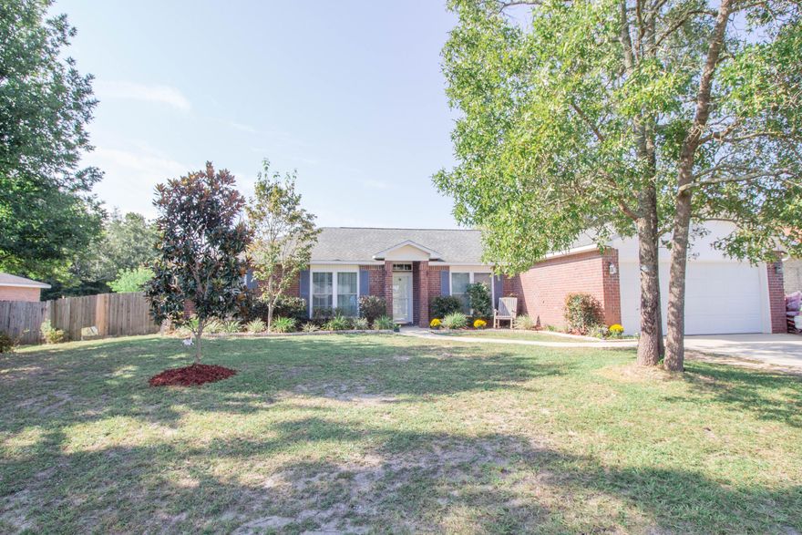 Great 4 bedroom 2 bath home located in south Crestview for a easy drive to the local beaches, shopping centers and local bases. The split floor plan allows for space and privacy and is great for entertaining family and friends. Engineered hard wood floors in the main areas, tile in the wet areas, and carpet in the bedrooms. Kitchen boasts ample granite counter and cabinet space for all your cooking needs to include a center island. There is a formal dining room plus a breakfast room providing you plenty of additional space for whatever your family needs are. The master bedroom is large and master bath has a garden tub, separate walk in shower, dual vanity sinks as well as a walk in closet. Large backyard with a covered and screened in back porch and privacy fencing. There are also two yard
