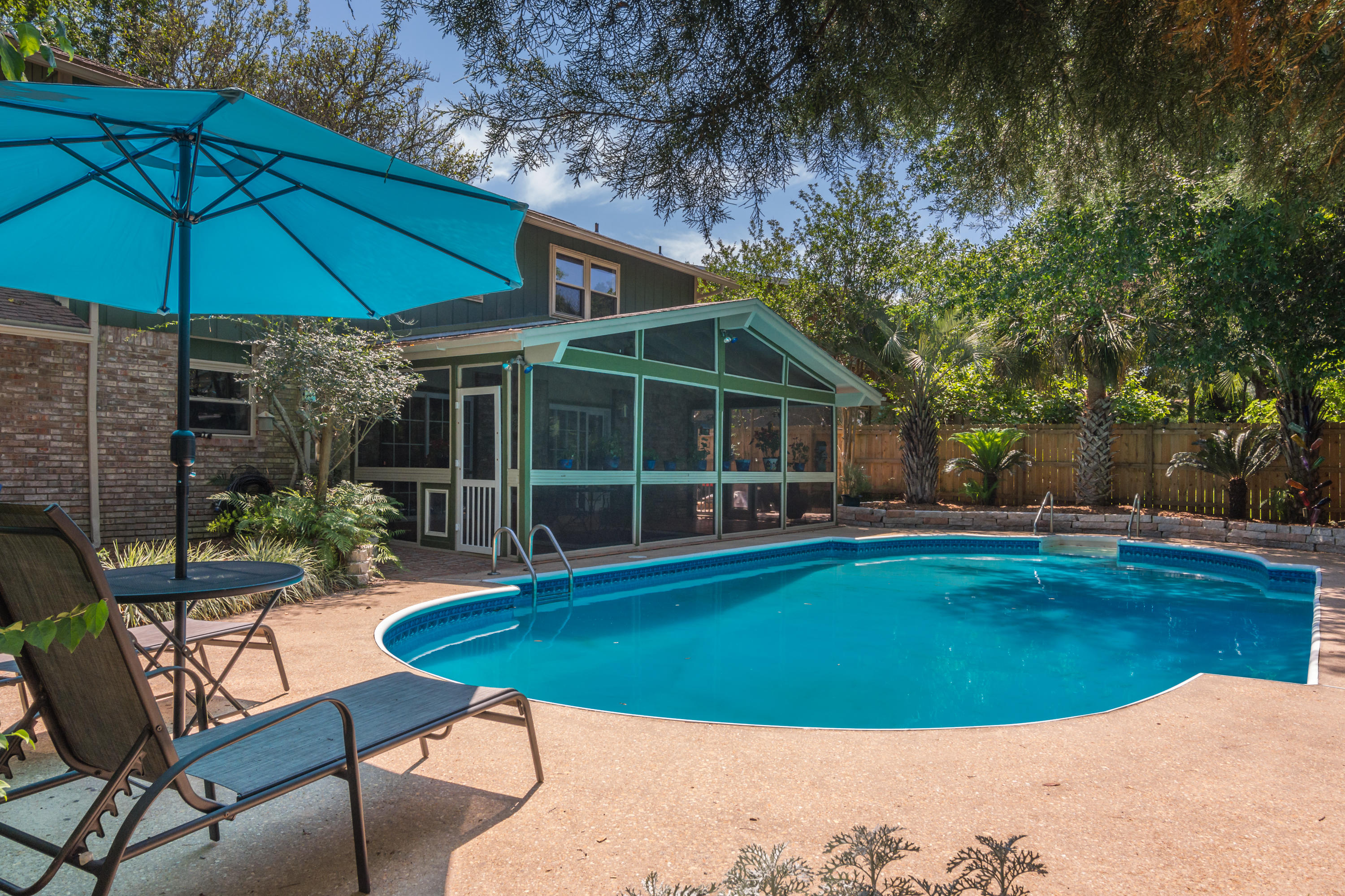 Immaculate Kenwood pool home just waiting for you to enjoy your summer days by the pool. Lovingly maintained by the owners, This, 2344 sq ft, 5 bedroom, 2.5 bathroom, 2 story home features 2 master bedrooms. One upstairs & one downstairs that is currently being used as a den.The best feature of this home is easily the large vaulted screened porch overlooking the beautiful pool deck and back yard area. Enjoy the outdoors year round with shade & protection from bugs.Fully rewired with copper wiring in 2018. New HVAC in 2018. New water heater in 2016. All new appliances in 2017. New driveway in 2012 & new wood privacy fence in 2017. Upgraded blown in insulation in the attic. And the pool liner is just 3 years old.