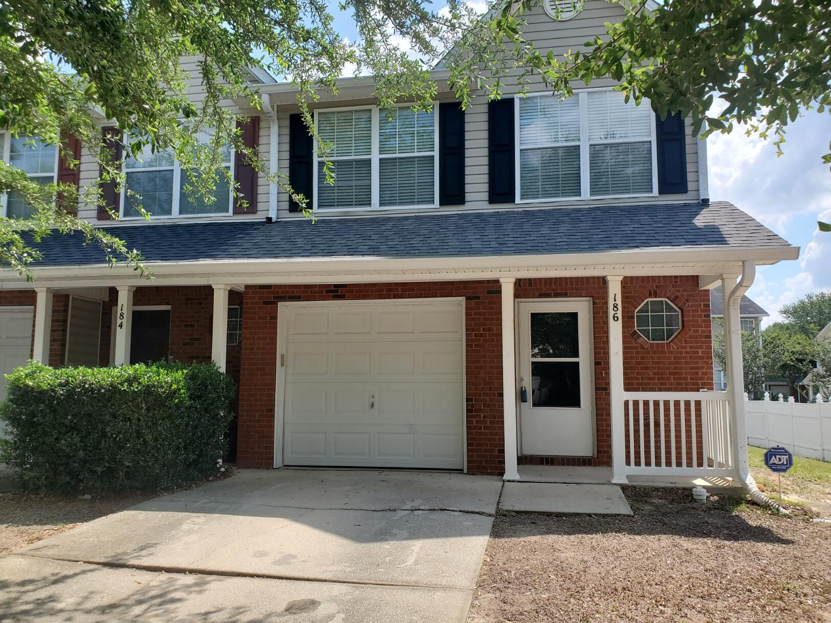 Immaculate, well-maintained townhome with 3 bedrooms and 2.5 baths. Fresh as new end unit with new roof in 2021, beautiful LVP flooring installed in 2017, HVAC 2020, appliances 2021. Fantastic location south of Highway 90 and close to shopping, restaurants, and hospital. You will love the spacious primary bedroom with en suite bathroom and TWO closets (one walk-in). All bedrooms and laundry room are upstairs. The kitchen boasts a breakfast bar and opens to the living and dining areas. Ceramic tile in kitchen and bathrooms provides extra protection for those areas. Nice backyard with patio invites barbeque and play time. Auto garage opener; ADT system installed for your safety and security at home and away. This townhome is the perfect starter home or money-producing investment property.