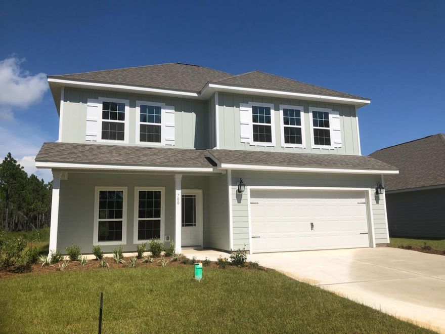 HUGE PRICE REDUCTION! Don't miss the opportunity to own a home in Eagle Bay Landing - limited home sites still available! This beautiful, spacious home sits on a desirable lot with wooded conservation on two sides, and walking distance to the community pool. Kitchen features ample counter space, and overlooks open concept living and dining area. Master bedroom is conveniently located on the main floor. Huge additional living space upstairs, perfect for a playroom, media room, or home office. Three additional bedrooms and two full baths located upstairs make for a functional and well thought out floor plan. Covered front and back porches are perfect for enjoying the outdoors in a quiet, beautiful community. Amazing closing cost incentives offered with use of preferred lender!