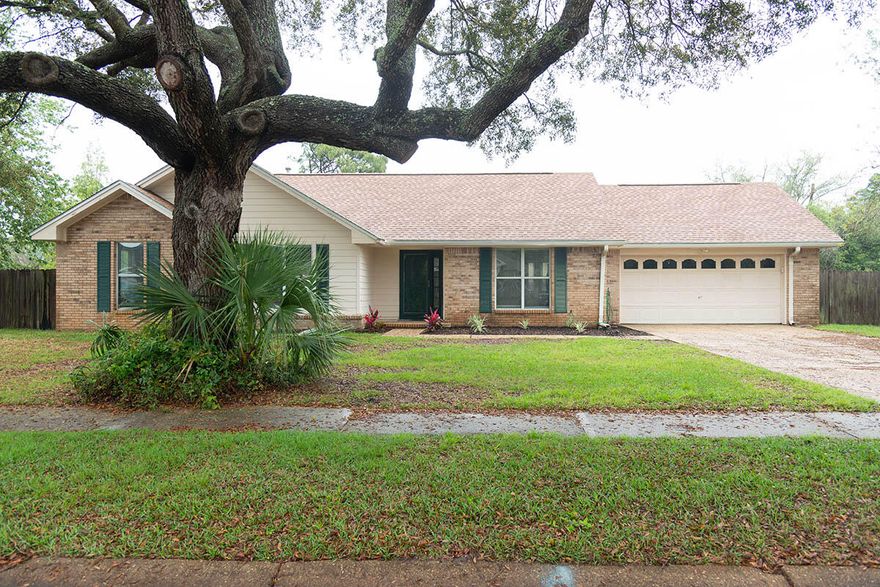 Welcome to this beautifully maintained 3 bedroom, 2 bath single story home. Inside, enjoy a bright, open living space with vaulted ceilings, wood style flooring, and a cozy brick fireplace as the centerpiece. The spacious kitchen features ceramic tile floors, a breakfast nook, and ample natural light from large windows. The split bedroom floor plan offers privacy, and the primary suite features a large walk-in closet and private bath. Sorry no pets allowed. All Coastal Realty Services residents are enrolled in the Resident Benefits Package (RBP) which includes renters insurance, HVAC air filter delivery (for applicable properties) and our best-in-class resident rewards program, and much more! More details upon application.