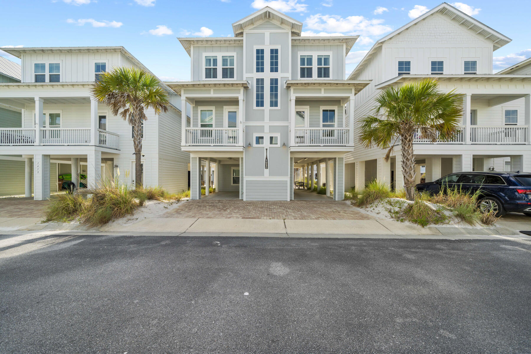 Welcome to Your Dream Investment Property in Navarre Beach! This stunning three-story beach house offers everything an investor or beach lover could hope for--located between the Santa Rosa Sound and the Gulf of Mexico, you'll enjoy breathtaking views from any of the three spacious balconies! This property features 5 bedrooms and 5 bathrooms, making it ideal for large groups, vacation rentals, or your own private retreat!The heart of the home is the open concept kitchen and living area, designed for seamless entertaining. The kitchen is a showstopper with sleek stainless steel appliances, granite countertops, and a gorgeous backsplash that ties it all together. Imagine preparing meals while chatting with guests as they relax in the inviting living space!The master suite is pure luxury featuring a spa-like bathroom with a soaking tub, a walk-through shower, and double vanity sinks. Every bedroom is designed for comfort, ensuring an unforgettable stay for all.  

There is plenty of room to park four vehicles, ample enclosed storage, covered areas to entertain, plus a community pool for all to enjoy!  

This home is located in the exclusive By The Sea subdivision, a quiet, gated community with direct access to both the sound and the Gulf. Whether you prefer a serene morning walk by the water, an adventurous day exploring the nearby Navarre Beach Marine Sanctuary, or catching some sun on Navarre's famous sugar-white beaches, this property offers the best of coastal living!

You're also just moments away from Navarre Pier, Juana's Pagodas, and Sailor's Grill local hotspots for dining and entertainment. The area is full of exciting activities like snorkeling, golfing, visiting the Sea Turtle Conservation Center, or relaxing at the nearby water park.

With rental projections grossing $108,550, this home is not just a beautiful retreat but a savvy investment opportunity. Don't miss your chance to own a piece of Navarre Beach paradisea coastal haven combining natural beauty and endless adventure! <4(

