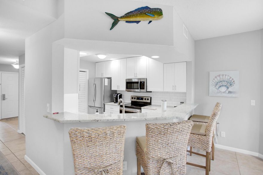 Remodeled, first floor, single story condo located on the 15th fairway of Baytowne Golf Course. 4-seater 2018 Star Golf Cart included! This home is bright, spacious, and perfect for a full time residence, vacation home or rental property. New HVAC 2017 and water heater 2016. Completely renovated kitchen & baths, stainless steel appliances, neutral grey painted walls, and coastal furnishings. Both bathrooms offer a double sink vanity and new walk-in showers. The large dining/living area offers a perfect space for family gatherings with two doors leading to the screened in patio. Also enjoy extra sleeping with a newly added hallway bunk area.