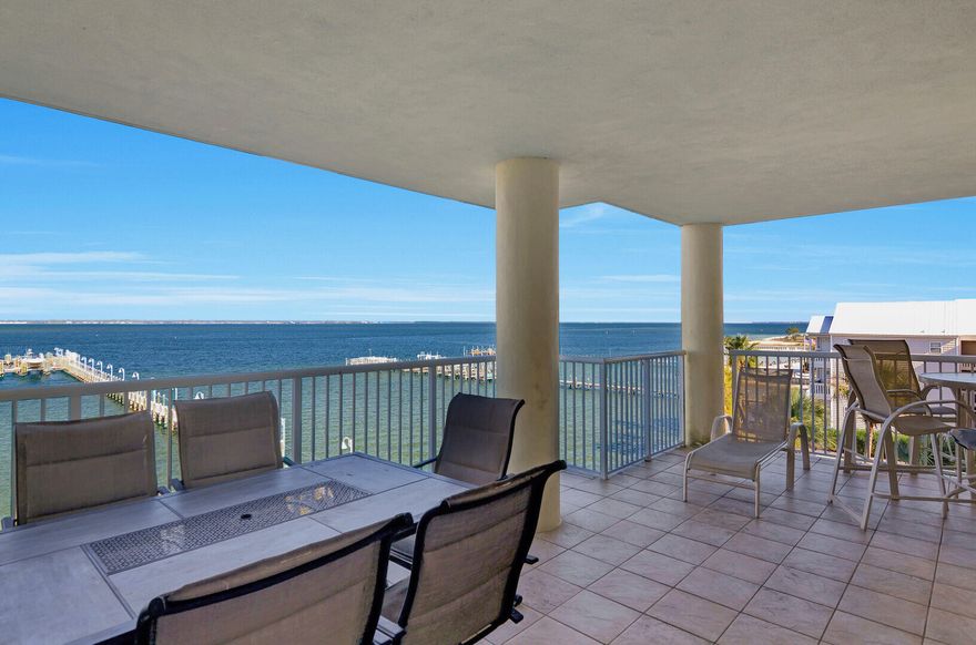Experience the best of Okaloosa Island at Destin West Unit 402--your front-row seat to stunning water views and world-class amenities! Wake up to breathtaking sunrises over the Bay and watch dolphins from your expansive balcony. Inside, nearly every room captures sparkling Bay views, making every day feel like a vacation. This spacious 1,776 sq ft, 3-bedroom, 2-bath condo comfortably hosts up to 10 guests in a smart split-bedroom layout that maximizes privacy and togetherness. The master suite is a true retreat, featuring direct balcony access and a spa-inspired bath: jetted tub, glass shower, dual vanities, and a generous walk-in closet. A spacious laundry room is perfect for hanging beach towels--ideal for active coastal living. Sold fully furnished and turn-key, Unit 402 delivers real investment value with a solid rental history and a projected $61K gross rental income. At Destin West Beach & Bay Resort, your family and guests will love the award-winning 700-ft lazy river, seven sparkling pools, three hot tubs, a modern fitness center, and an indoor Kids' Fun Zone. Step outside and you're just moments from local restaurants, shopping, mini-golf, the Gulfarium, a fishing pier, and legendary white-sand beaches.

Whether you're searching for a vacation oasis or a smart investment, Unit 402 at Destin West Beach & Bay Resort is ready to welcome you. Ready for the extraordinary? Schedule your private tour today!
