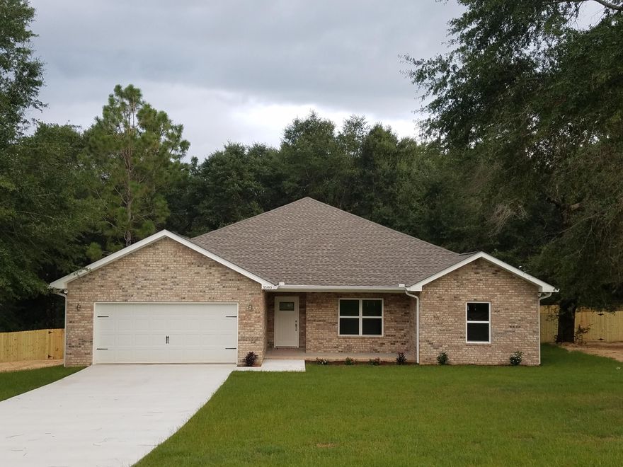 BRAND NEW ALL BRICK HOME WITH ACREAGE BUILT BY VA REGISTERED CONTRACTOR. Features LARGE tile wood look floors thru-out the main area with carpet in the bedrooms. Wide baseboards, 10' Trey ceilings in Living room and Master Bedroom, with 9' ceilings thru-out home. Very open floor plan for entertaining. Huge Living Room is open to the kitchen separated by a island breakfast bar that is big enough for family dining table if desired. Dining area opens to covered porch for outdoor enjoyment with a HUGE back shaded wood deck. Kitchen has gorgeous cabinets with granite countertops and stainless-steel appliances. Several recessed lights, to include bar pendants, provide lighting that enhances the feel of the home. Come see the acreage this house sits on with the pleasant feeling of the outdoors.