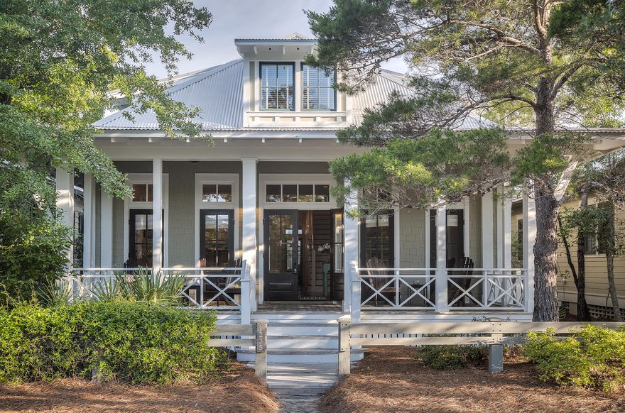 This is it! The house you've been waiting for.... wonderful home located in phase 2, steps to the kids camp and across from a beautiful park. This magnificent WaterColor home features 4 bedrooms, one of which has 4 built-in bunk beds, 4 full baths, large living area for entertaining, and a great kids space upstairs. The home has deep porches on both the front and the back along with a carport, outdoor shower and plenty of parking.