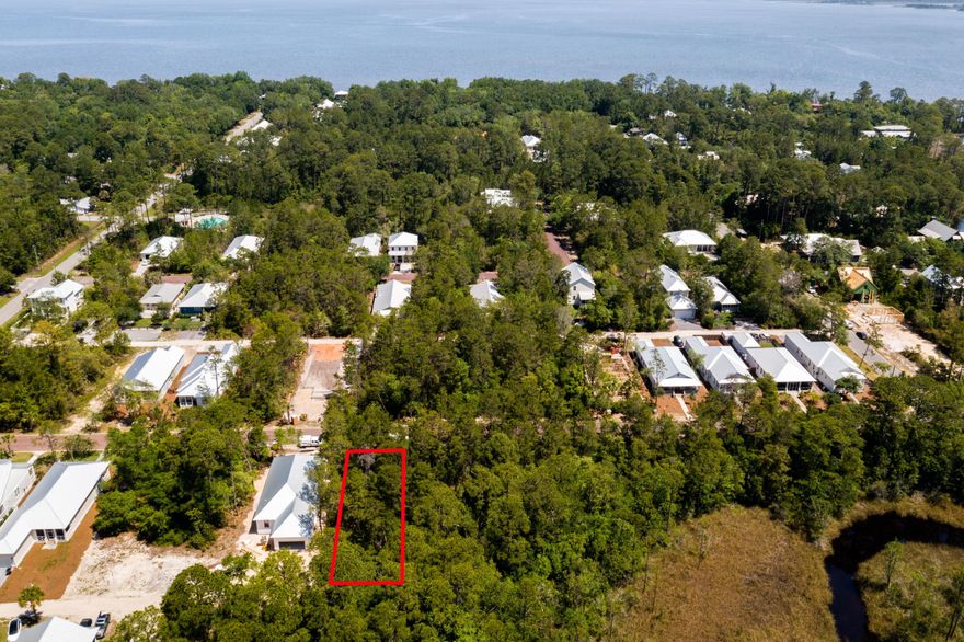 The opportunity to build a house on your terms in Historic Point Washington starts with this Grayton Bayou lot!  This Flood Zone X lot with Private Drive is situated by the neighborhood's private pool and jacuzzi. There is also a public dock with boat launch and Bayfront park - perfect for a picnic or to put in a kayak/SUP.  Whether this is your first home in South Walton or your next, Grayton Bayou is the perfect spot to build.