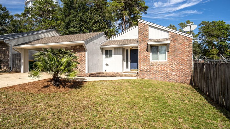 Back on the market, no fault of the seller! Move-in ready home on great cul-du-sac central to restaurants and shopping. The open concept home features high ceilings, beautiful natural light and a brick fireplace in the living room with 2 sets of sliding glass doors that lead into the fenced, private back yard. Adorable galley kitchen with granite countertops, tile backsplash and all appliances.  Backyard has a storage shed for lawn equipment as well as an attached 2 space carport. Come and see this home today!