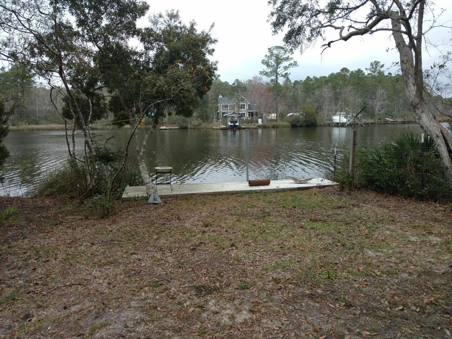 MALLET BAYOU LOT COMPLETE, JUST ADD HOME! Beautiful location on Mallet Bayou with two docks, one with floating dock attached. Lot is cleared and has water, sewer and electric already in place. A single story home has been designed for the lot to offer approximately 1,900 sf, Seller's plans for the future have changed, but what an opportunity for a Lucky Buyer! The Seller has done all the hard work! These plans are available or you can design your own Bayou Dream Home! Great location south of Highway 20 & north of Choctawhatchee Bay. Mallet Bayou gives you good fishing and boating. Fun for all! New growth taking place in Freeport with the Publix Shopping Center only 5 minutes away. Take a minute to check this one out - it won't last long!