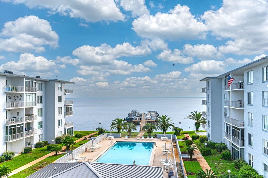BUYER GOT COLD FEET, make an offer. This beauty has a million-dollar view of the Choctawhatchee Bay! Off the beaten path yet close to the best of everything Destin offers. Open your front door to new flooring, new fixtures, new kitchen appliances, new water heater and HVAC, fresh paint, quartz countertops, soft close drawers. Bask in the sun or watch the storms roll in from the spacious balcony, it's paradise either way. Both the bedroom and living room have waterfront views, including the sparkling pool and bayfront docks. This unit has a BONUS room large enough for bunks, an office, etc! Plus, dedicated storage for kayaks, etc. Short term rentals are not permitted at Century Park, adding to your tranquil lifestyle. VA approved! Sellers are motivated and this is a unique deal.