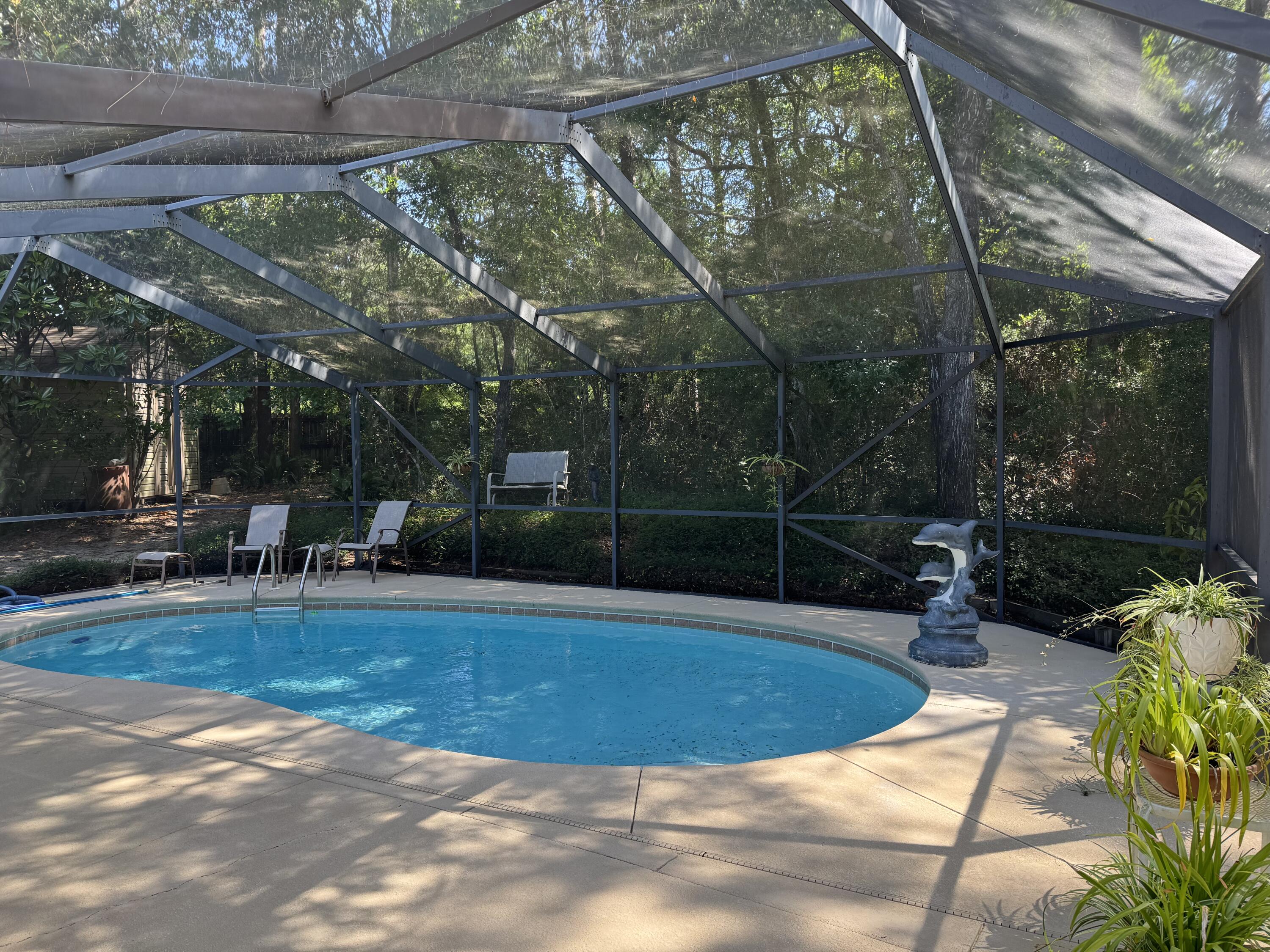 Welcome Home to this one owner, enclosed POOL home for sale in Rocky Bayou near everything....grocery stores, schools, military bases, and white sandy BEACHES! Enjoy the nearly half acre fenced in yard with mature landscaping, backyard storage building, and enclosed gunite pool. Looking for 4 BEDROOMS, a newer roof, new hot water heater, and whole house water filter? You've found it! Almost half an acre of privacy awaits your arrival in the lovely area of Rockywood. Call your favorite agent today! This all brick home is ready for YOU!