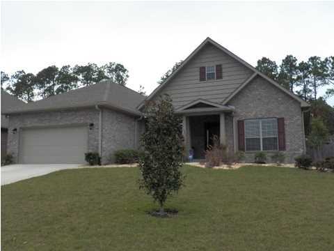 Luxury living at a very affordable price! This beautiful home has many upgrades and customs features. Once Inside, you will find a very spacious and open floor plan. There are 4 bedrooms /2.5 bathrooms plus an office/ Media room that can also be used for a parlor or Formal living room. The country kitchen is a chef's delight. There is ample storage, counter space, a pantry, stainless steel appliances, beautiful floors, recessed lighting and raised ceilings. ( there is plenty of room for a kitchen island to be added later). The home is wired for upgraded media. The foyer has shiny'' wood floors and the rest of the home has carpet or tile. There are raised ceilings, textured throughout and some rooms are trayed. There are interior arches, and great designs. Outside you will enjoy the