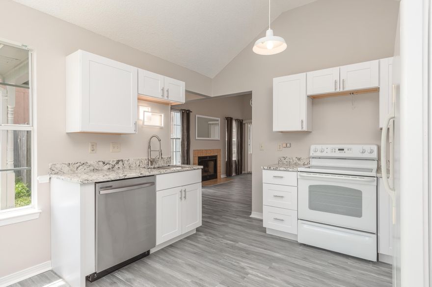 Renovated 3 bed and 2 bath home in Mary Esther less than 5 mins to Hurlburt field. This home is move in ready with a New Dimensional Shingle Roof, new white Shaker kitchen cabinets, and new Granite Countertops. New Stainless Steel Appliances will be delivered in the next few weeks which will replace the white appliances currently in the home. The spacious living room features a fireplace with vaulted ceilings. The Luxury Vinyl Plank flooring throughout makes this home easy to maintain. Enjoy entertaining or relaxing in the back deck and spacious back yard. Copper wiring throughout. Don't wait, tour this home today! NEW Samsung Stainless Steel Microwave, Range and Fridge to be delivered end of July