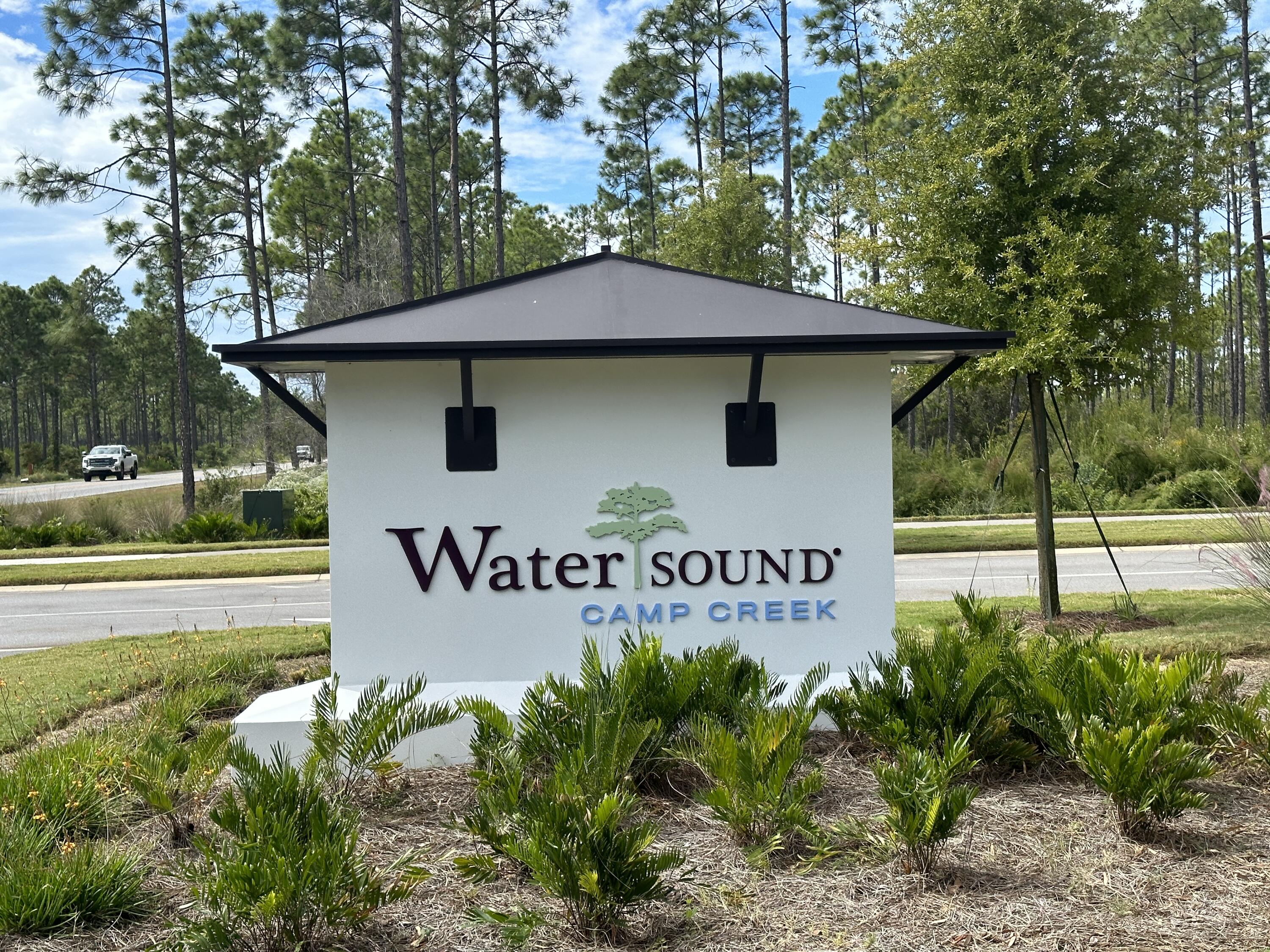 Discover the allure of Watersound Camp Creek. Lot 33 faces east for morning sunrises on the front of the home and sunsets over the pool and lake in the back. Within a short walk or golf cart ride, you'll reach Camp Club House, Scenic Highway 30A and the Gulf of Mexico, as well as the bustling Watersound Town Center and a newly-opened Publix. This gated community boasts 262 homesites, ranging from approximately a quarter-acre to just under one acre in size. This rental-restricted community also offers an amenity center with dual pools, a lazy river, pickleball and tennis courts, a wellness center,and an on-site restaurant