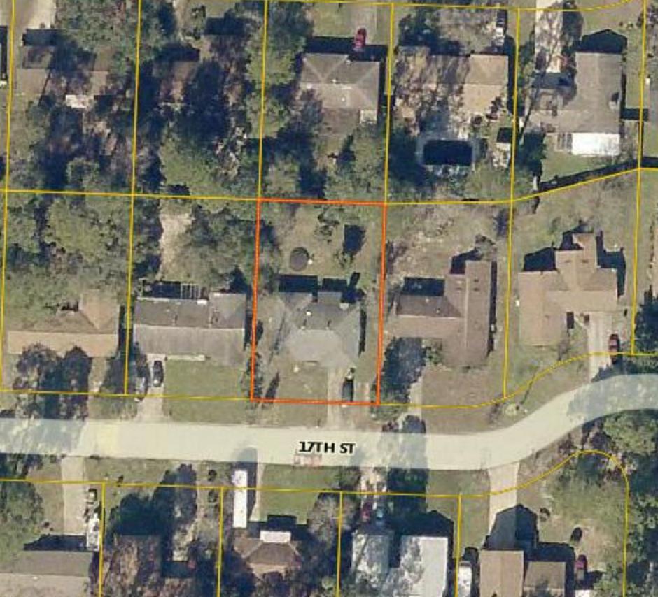 3/2 home with covered patio and located just north of Valparaiso Blvd. TLC needed.