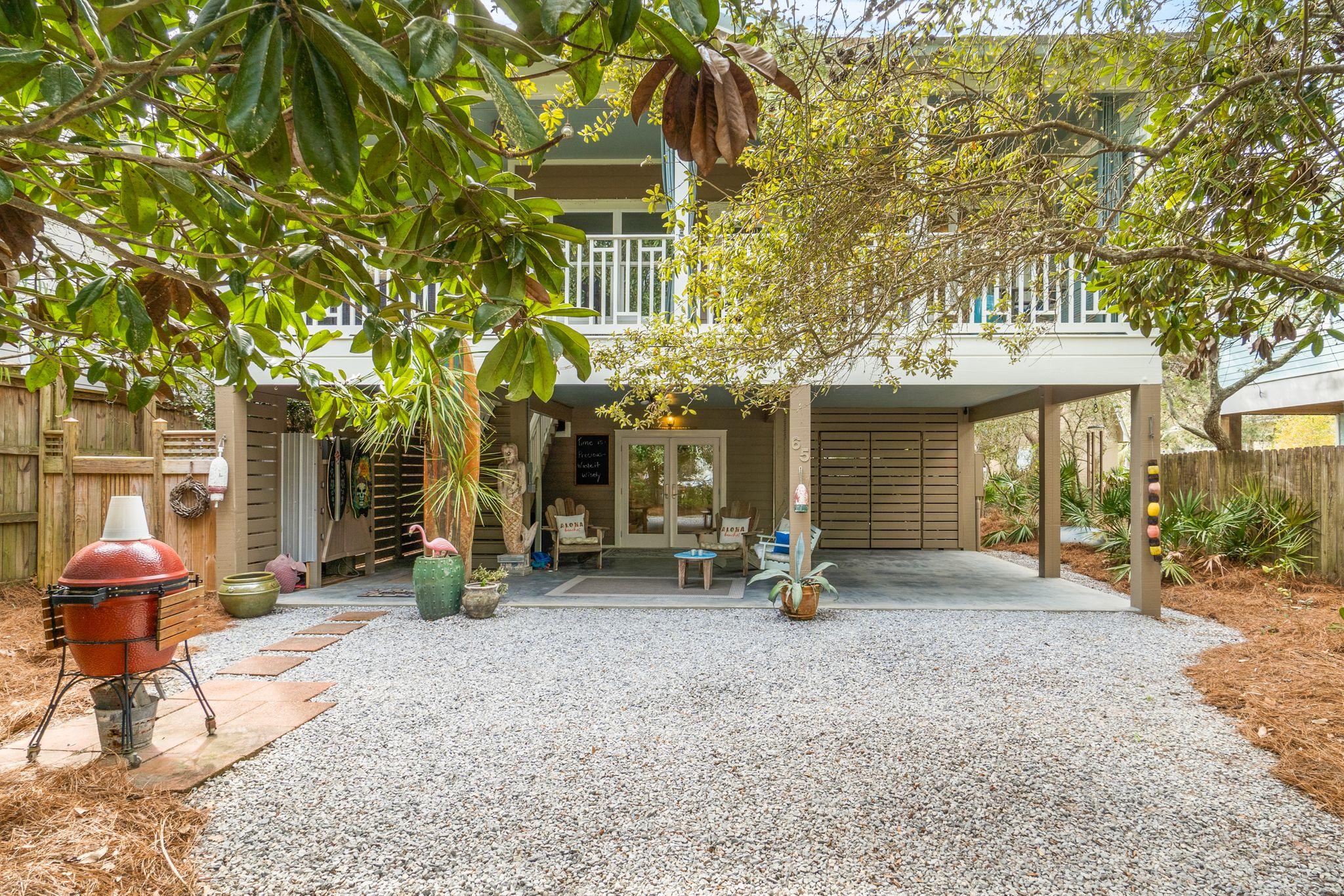 Fantastic Florida Cottage South of 30A! Easy walk to both the Gulf of Mexico and Eastern Lake. Spend time on your private porch enjoying beach breezes or head on over to the Gulf. Enjoy kayaking and paddle boarding in Eastern Lake, one of few remaining rare coastal dune lakes. This home has been loved and is in excellent condition.  A dreamy Seagrove spot, surrounded by old live oaks & your perched up in the branches in your peaceful tree house. The set backs on this home leave room for more expansion (pool or add to the home). Plenty of space for the golf cart, vehicles and water toys. Outdoor shower next to the stairs & a fenced dog run to the south side of the house. Information deemed to be accurate, not guaranteed.