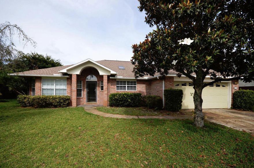 All Brick 3 bedroom, 2 bath, split floor plan w/Florida room has a great floor plan and large rooms. The living room features raised ceilings, ceiling fan, corner fireplace and opens to the kitchen/dining area. The kitchen features: center island, corner sink w/bay window, smooth top range, large pantry, pullout drawer, instant hot water (tankless Water Heater) and large eat-in area. The formal Dining room could opt as an office or bonus room. Bedrooms are larger than in most homes. The Florida Room is full of natural light with full surround-glass and 15-lite French doors. Great curb appeal and landscaping. Public water, public sewer, sprinkler system, well pump, patio, great turf, . 5 miles from Hurlburt AFB, minutes to beaches, schools and shopping. Make