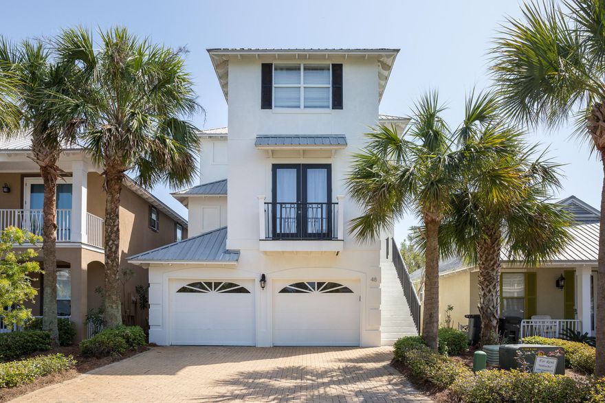 SELLER SAYS BRING ME AN OFFER! Beautiful 3 story home conveniently sitting on one of the largest resort community pools along Scenic Hwy. 30A. Recently repainted exterior and interiors. Light, bright, open and spacious defines this beach vacation home. Lovely modern touches throughout gives this home that Miami Beach feel. 1st floor features a double car garage GAME room with table games, TV, sitting area and much more, ideal to keep the kids busy! 1st floor ALSO includes a full guest apartment that leads out to it's own private patio. Apt has it's own full sized kitchen, full private bathroom with tub shower combo and a double trundle sofa bed PLUS a four bunk bedroom with 2 twins & two doubles. 2nd floor is the main floor featuring a large Great Room with super views looking out overthe 12,000 square foot community resort pool, fully equipped kitchen with stainless appliances, large dining area plus your own bar set up!  Great room is expansive and is ideal for large gatherings!  Step out to the balcony and sit a spell, enjoy the gulf breezes while having coffee or refreshments.  Main floor includes a guest bedroom with two Queen beds, laundry room and full bathroom with private tub shower combo.  3rd floor features your huge Master bedroom that opens out to a lounging balcony that overlooks the resort style pool, also features a private en suite bathroom, walk in closet, double sinks, soaking tub and separate shower. 3rd floor also features a large guest suite with King bed, private en suite full bathroom plus a baby bed for the little ones.  This home has it all! More pictures on the way!  Buyer to verify all information.