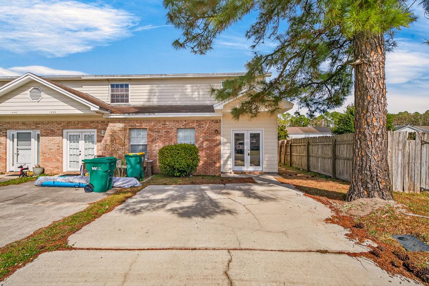 Beautifully updated 3-bedroom, 2-bath end-unit townhome offering 1,332 sq ft of comfortable living space in a convenient Fort Walton Beach location. The functional floor plan features one bedroom and full bath on the first floor, ideal for guests, a home office, or added flexibility. Upstairs you'll find two additional bedrooms and another full bath, providing separation and privacy.The home has been freshly updated with new carpet, new luxury vinyl plank flooring, and upgraded lighting, creating a clean and modern feel throughout. The open living and dining area flows into the kitchen, making the space perfect for everyday living and entertaining. As an end unit, the property offers added privacy and natural light. Step outside to a small fenced backyard, ideal for relaxing or for pets.

For added peace of mind, the seller will install a brand new roof prior to closing.

Conveniently located near Eglin AFB, Hurlburt Field, shopping, dining, and the Emerald Coast beaches, this home makes a great primary residence, second home, or investment opportunity.