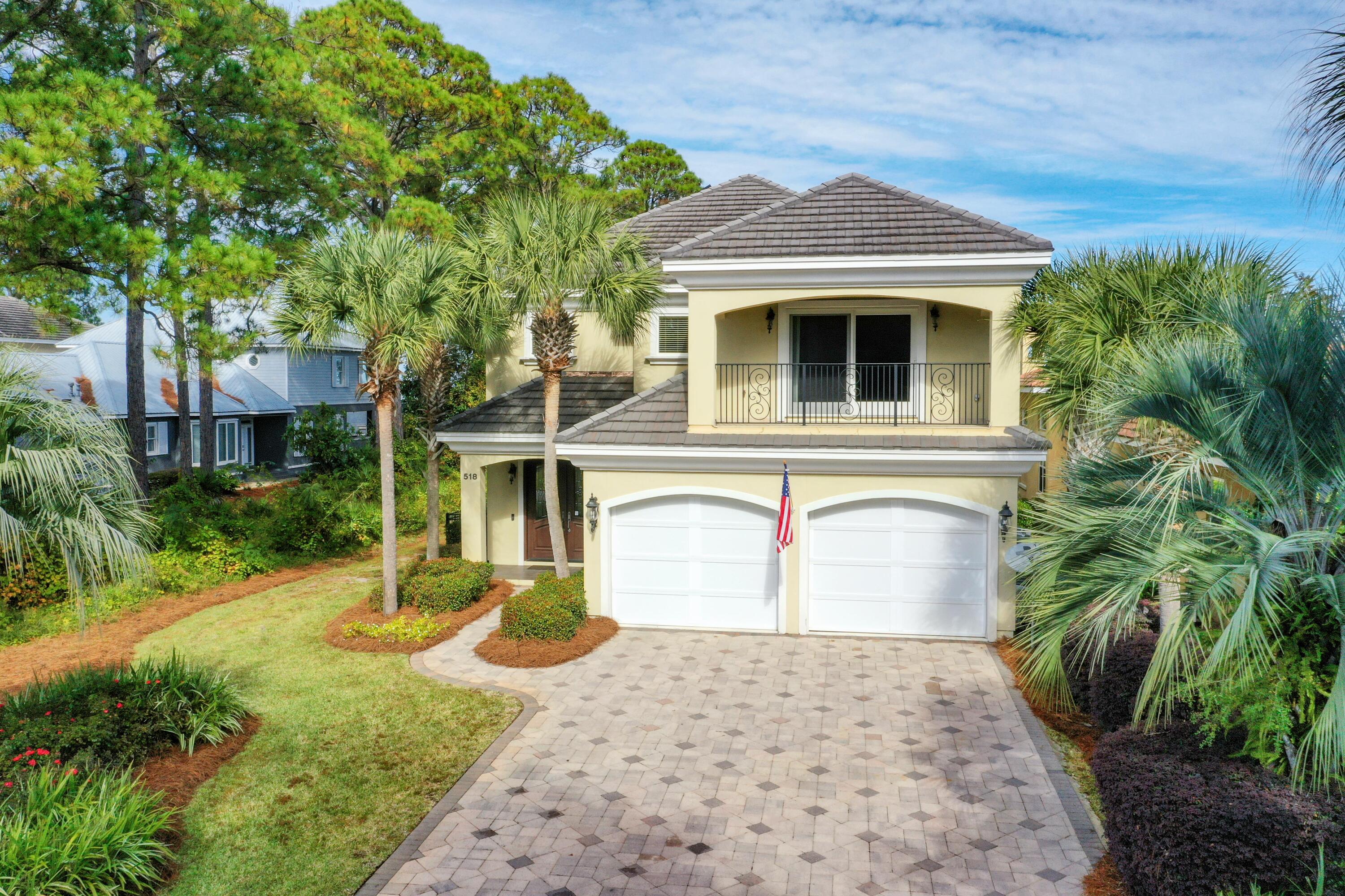 BONUS: the most amazing dock on the Bay in Miramar Beach! This 2 story home features an open concept living area with a gas fireplace on the first floor along with kitchen, dining, half bath and laundry. THERE IS A MASTER SUITE ON EACH FLOOR. The 2 additional bedrooms are generously sized each with it's own private bath. The 2nd floor includes a large recreation room with wet bar/refrigerator and balcony overlooking the Bay which could be a 5th bedroom. Built by award winning builders, Dixon Kazek Construction (DKM Custom Homes) this home features traditional hard coat stucco exterior, cement tile roof, built in pest control, icynene attic insulation & a slab elevation at 10.26 feet above sea level. The current owner added solar panels for additional energy efficiency.