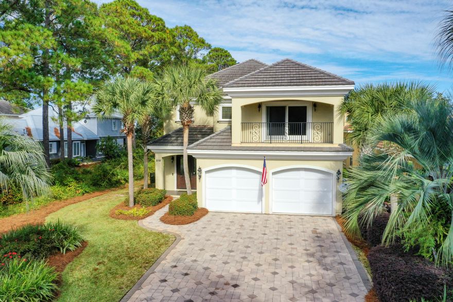 BONUS: the most amazing dock on the Bay in Miramar Beach! This 2 story home features an open concept living area with a gas fireplace on the first floor along with kitchen, dining, half bath and laundry. THERE IS A MASTER SUITE ON EACH FLOOR. The 2 additional bedrooms are generously sized each with it's own private bath. The 2nd floor includes a large recreation room with wet bar/refrigerator and balcony overlooking the Bay which could be a 5th bedroom.  Built by award winning builders, Dixon Kazek Construction (DKM Custom Homes) this home features traditional hard coat stucco exterior, cement tile roof, built in pest control, icynene attic insulation & a slab elevation at 10.26 feet above sea level. The current owner added solar panels for additional energy efficiency.