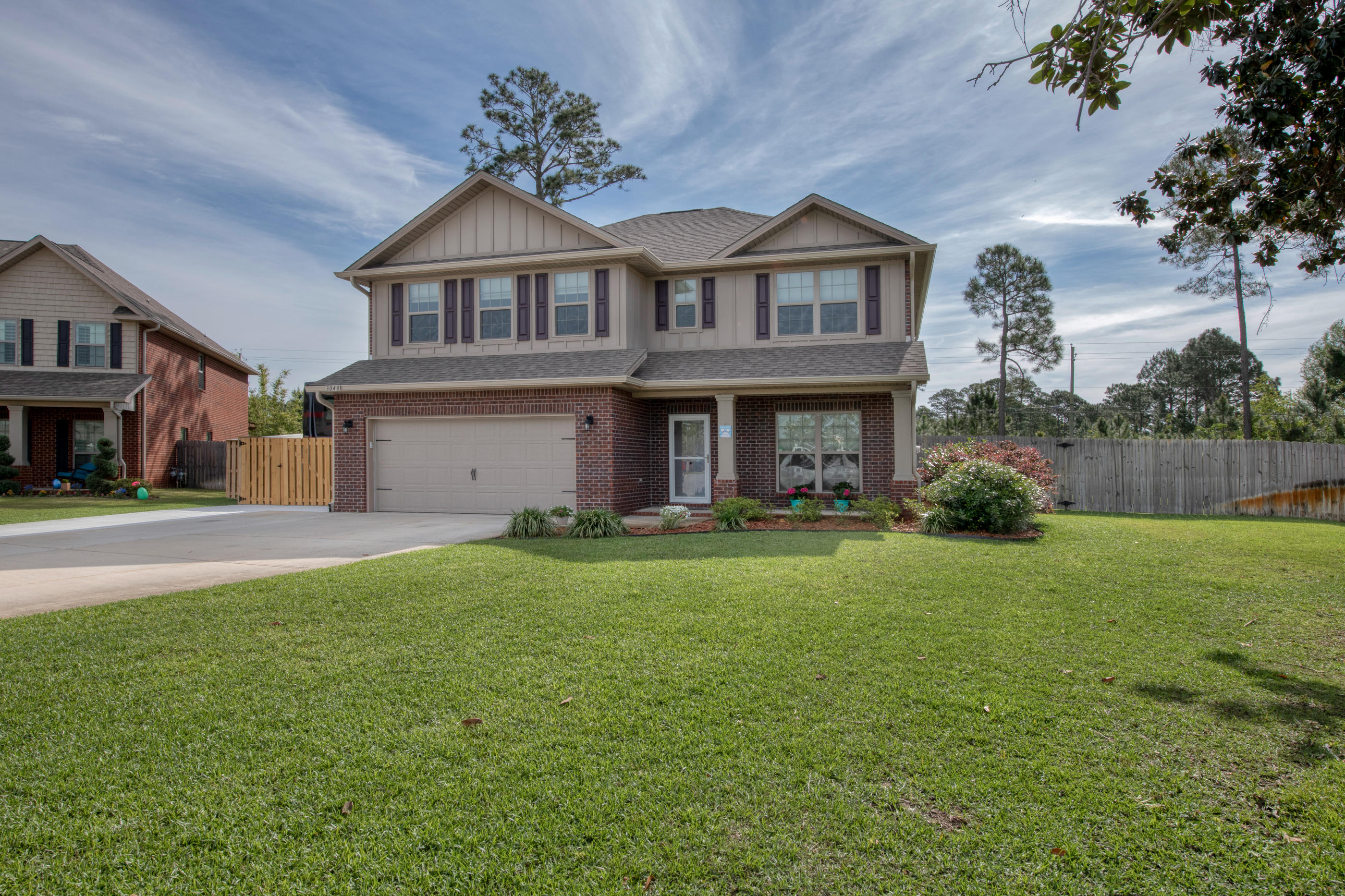 Beautiful Newer 4-bedroom cul-de-sac home in Forest at Oriole Beach Subdivision! This is the gorgeous 2 story home with a spacious floor plan, downstairs Master Suite and lots of upgrades. Built in 2014, this home features granite counter tops, ceramic tile, and a large 20 x 15 bonus room on the second floor with a great view of the cul-de-sac. The living room is highlighted by crown molding and is open to the kitchen. This spacious kitchen features cherry woodcabinets with undermount lighting, granite countertops with elegant tile backsplash, a breakfast bar, and stainless appliances. Eat-in kitchen with walkout to privacy-fenced yard an walkout to privacy-fenced yard and covered porch. The Master Suite features crown molding and two walk-in closets. Granite countertops