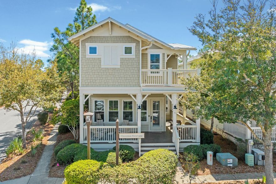Welcome to 5 Cinnamon Fern, a beautifully maintained coastal retreat in the sought-after NatureWalk at Seagrove community. This prime corner homesite is just over the neighborhood's iconic wooden bridge, offering a serene backdrop while being steps from the community pool and a scenic path to Publix and the WaterColor shopping center.  Backing to lush woods for privacy, this well-maintained home boasts a strong rental history, making it a fantastic investment opportunity or personal retreat. It features a golf cart barn with additional temperature-controlled storage and convenient overflow parking nearby. The inviting wraparound porch sets the tone for relaxation, leading into a bright, open living space with wall-to-wall windows, solid pine floors, and elegant crown molding. The kitchen is a chef's delight, boasting upgraded cabinetry, a custom vent hood, and a dual-fuel GE stove.  

With two primary suiteseach featuring spa-like baths with dual sinks, separate soaking tubs, and walk-in showersthis home is designed for comfort. Upstairs, a versatile loft area with a daybed, a bunk room, and an additional bedroom share a spacious bathroom with double sinks. The second primary suite offers a private open balcony, perfect for taking in stunning sunset views.  

NatureWalk is an amenity-rich community with two resort-style pools, pickleball courts, fitness stations, and a scenic trail leading to the sugar-white sands of 30A. Located just minutes from Seaside and the best of the Emerald Coast, yet tucked away for peaceful relaxation, this home is a proven rental favorite and an ideal coastal escape.  

Don't miss your chance to own a slice of paradise! Schedule your private tour today.