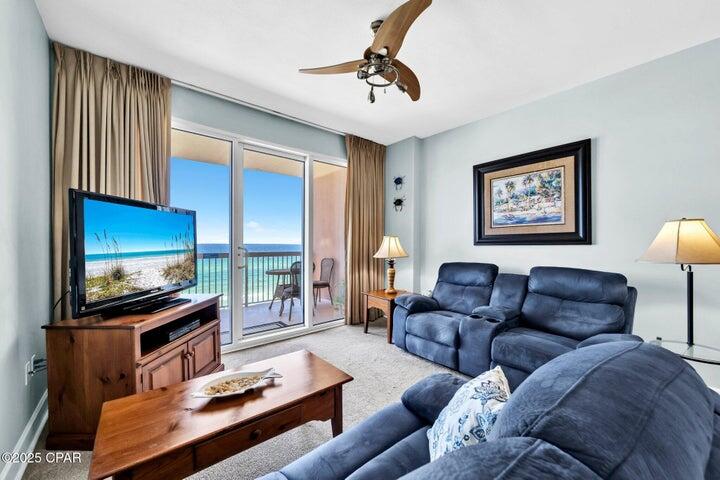 An absolute must see! Arguably one of the most favored floorplans in PCB. Sunrise Beach unit 705 is the beach getaway that you have been dreaming of! It also has a PRIME lower floor location in the deluxe 25-story Gulf front complex - forever gulf views!. This premium condominium features a Gulf front master suite, a large bunk room, 2 full baths. It lives and rents like a 2 bedroom and sleeps 6. The property lives large with an open floorplan and 9' ceilings and the three panel sliding glass doors allow for fabulous Gulf and sunset views from the balcony, living room, dining room, kitchen, & master suite providing the ultimate alfresco living and entertaining environment!