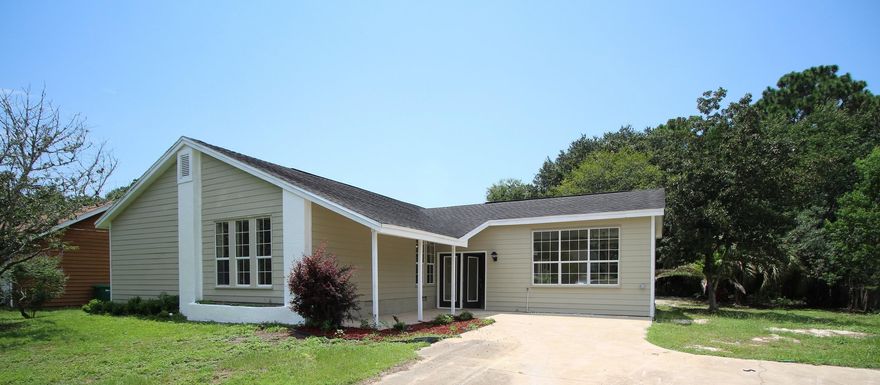 COMPLETELY REMODELED 3 BED 3 BATH HOME  READY TO MOVE IN!!! With Newer Dimensional Shingle Roof, New AC System, New Paint Inside & Out, New Kitchen Cabinets with Granite Countertops, New Stainless Steel Appliances, New Wood Floors, New Tile Floors, New Carpeting, New Lighting & Fans, New Vanities, Updated Bathrooms, new hot water heater and more  there is no honey do list, just move in and relax. This home is comfortable and spacious and includes an open floor plan. Don't hesitate on this exceptional opportunity!