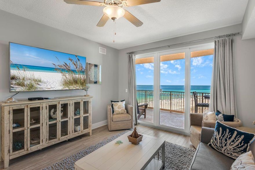 Delight yourself in breathtaking views from the 10th floor of the 2020 new build at Calypso III, conveniently located next to Pier Park. This three-bed, two-bath condo, that was previously the model unit, features more than 1,300 square feet of living space and shows well with EVP flooring, coastal furnishings, and white shiplap accents. The views from the covered balcony are second to none, as are the amenities including a pool that is partially covered, cabanas, a hot tub, a fire pit, a fitness area, and a parking garage. Inside the unit, enjoy an upgraded appliance package and granite countertops in the kitchen along with a custom-built bench along the wall for extra seating and storage.