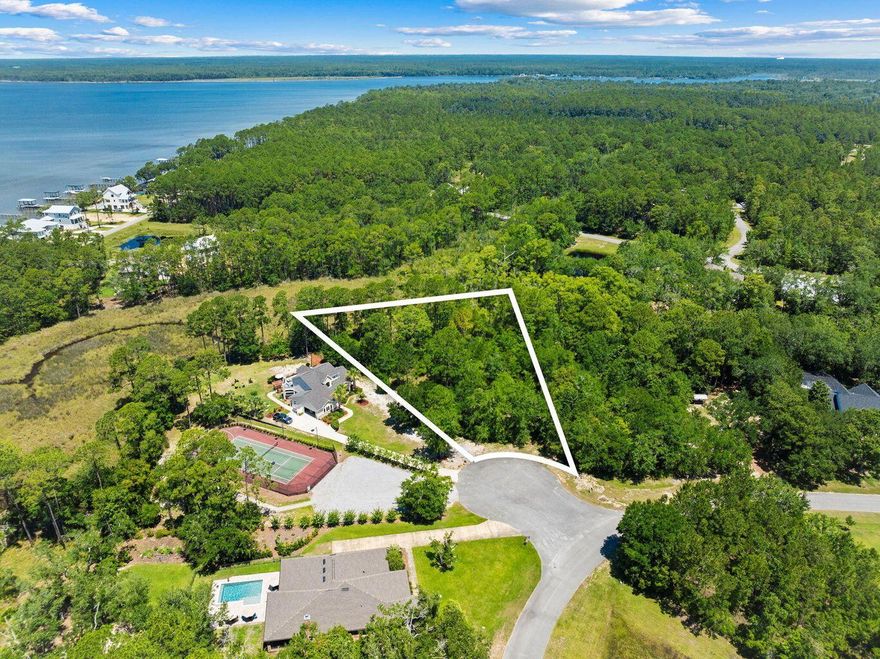 A fabulous lot on a quiet cul-de-sac is ready for you to build your dream home! And I mean....READY! Boundary survey, wetland delineation study, topographical survey all DONE! Just bring your building plan, or buy lot 77 too and use our building plan from Randy Wise Homes! The lot has waterview and is a short distance to the community tennis courts and a boardwalk to Choctawhatchee Bay. Your personal sunset is waiting for you!