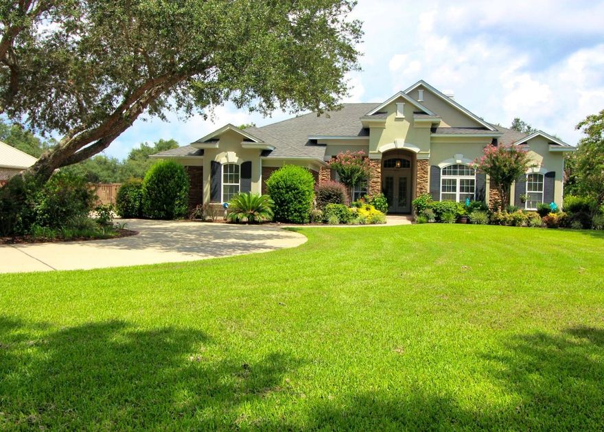 BUYERS' FINANCING CONTINGENCY NOT MET, SO...THIS AWESOME HOUSE IS BACK ON THE MARKET!!!!Gorgeous custom-built executive Rutenberg home ideally situated on the desirable oak tree lined Soundside Drive along the Santa Rosa Sound. This luxury 5 bedroom, 3.5 bath home features 2 master suites, an enclosed gunite pool on a 3/4 acre lot, adorned with mature oak and citrus trees, extensive professional landscaping, a fire pit and a climbing wall, all of which gives the fenced yard a park-like setting. This single story open floor plan offers extensive architectural highlights, including 12' ceilings, single and double crown molding throughout, stone fireplace, double tray ceilings with medallions, arched interior doorways and niches, decorative columns, built-in cabinetry and french doors. MORE.