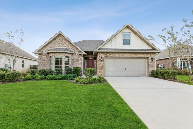 WATERFRONT, Beautiful, well maintained, single level living floor plan in the Whispers neighborhood of Hammock Bay with a 17 x 14 FLEX room upstairs that could be used for a 4th bedroom or office. This home has a 22 foot deep garage that will house a small boat or a big truck!  Great open floorplan with a large master suite to include a double vanity, oversized walk-in master closet, a soaking tub, beautiful tiled shower. With hardwood floors throughout the main living spaces, carpeted bedrooms, and tile floors in the kitchen and baths, granite countertops, and recently painted, everything is ready for the new owners. The 16 x 12 covered porch overlooking the lake is a perfect place to relax after enjoying all of the amenities that Hammock Bay has to offer. This yard will accommodate a pool.

There is a $12+ million, 60-acre Sports Complex featuring ball fields/parks, playground with a splash pad, lighted tennis courts and it hosts community events like Easter egg hunts, rodeos, and disc golf tournaments.  The Lake Club at Hammock Bay includes a 25 meter lap pool and a resort-style pool, lighted tennis courts, lighted basketball courts, putting green, large kid-friendly playground,  meeting/functions facility, caterer's kitchen, and 6000 sq. ft. clubhouse with movie theatre. The new Fitness Club at Hammock Bay is a 4000 sq. ft. state-of-the-art fitness facility featuring Body Master Weight equipment and Life Fitness cardiovascular equipment w/flat screen TV's. Hammock Bay offers a dog park, Canine Commons, picnic pavilion, and a large network or walking and biking trails. Come check out the Hammock Bay lifestyle.
