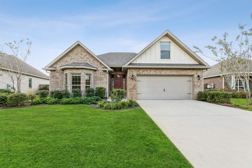 WATERFRONT, Beautiful, well maintained, single level living floor plan in the Whispers neighborhood of Hammock Bay with a 17 x 14 FLEX room upstairs that could be used for a 4th bedroom or office. This home has a 22 foot deep garage that will house a small boat or a big truck!  Great open floorplan with a large master suite to include a double vanity, oversized walk-in master closet, a soaking tub, beautiful tiled shower. With hardwood floors throughout the main living spaces, carpeted bedrooms, and tile floors in the kitchen and baths, granite countertops, and recently painted, everything is ready for the new owners. The 16 x 12 covered porch overlooking the lake is a perfect place to relax after enjoying all of the amenities that Hammock Bay has to offer. This yard will accommodate a pool.

There is a $12+ million, 60-acre Sports Complex featuring ball fields/parks, playground with a splash pad, lighted tennis courts and it hosts community events like Easter egg hunts, rodeos, and disc golf tournaments.  The Lake Club at Hammock Bay includes a 25 meter lap pool and a resort-style pool, lighted tennis courts, lighted basketball courts, putting green, large kid-friendly playground,  meeting/functions facility, caterer's kitchen, and 6000 sq. ft. clubhouse with movie theatre. The new Fitness Club at Hammock Bay is a 4000 sq. ft. state-of-the-art fitness facility featuring Body Master Weight equipment and Life Fitness cardiovascular equipment w/flat screen TV's. Hammock Bay offers a dog park, Canine Commons, picnic pavilion, and a large network or walking and biking trails. Come check out the Hammock Bay lifestyle.